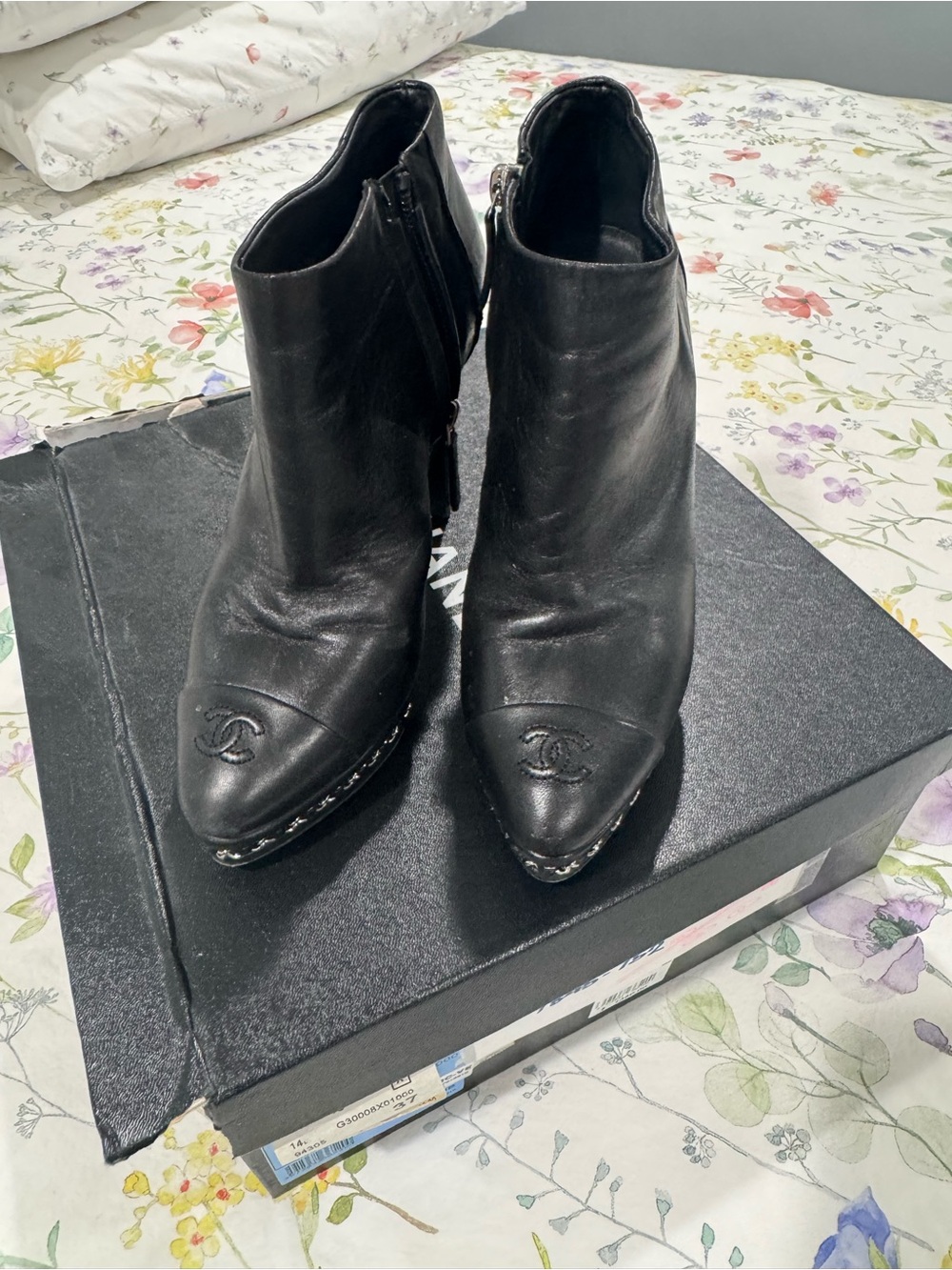 CHANEL Black Leather Pointed Toe Ankle Booties with CC Cap